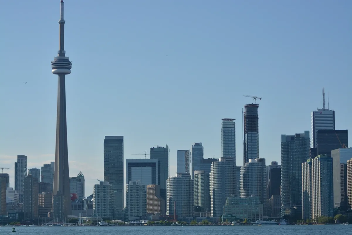Toronto skyline with the CN Tower; SpikeSecure serves Canadian clients remotely from India