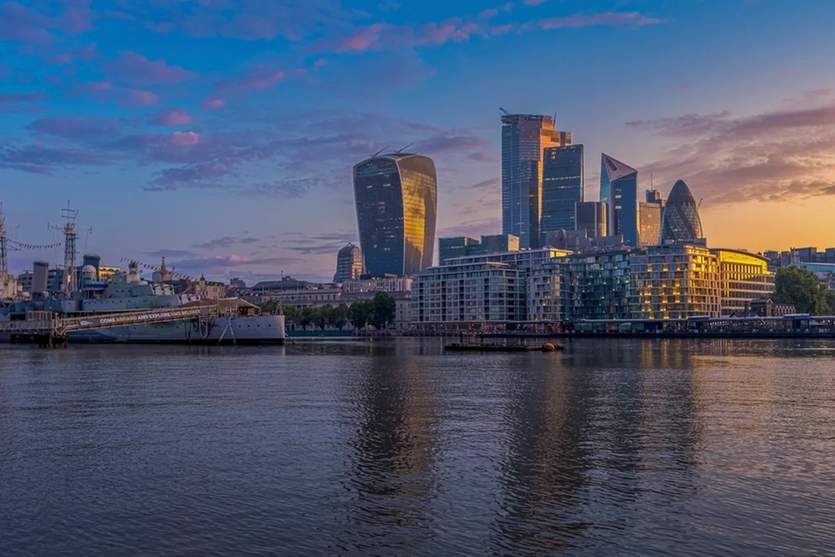 London skyline along the Thames; SpikeSecure serves UK clients remotely from India